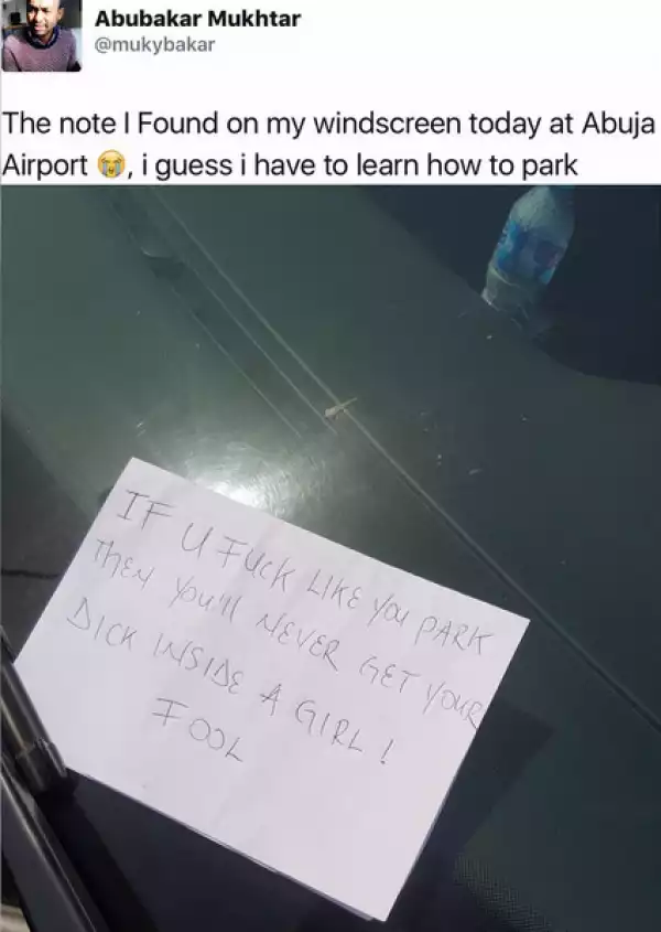 Hahaha! See What Driver Saw On His Car After Parking Wrongly In Abuja